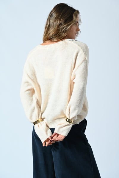 MAGLIA SCOLLO A V CON STRASS