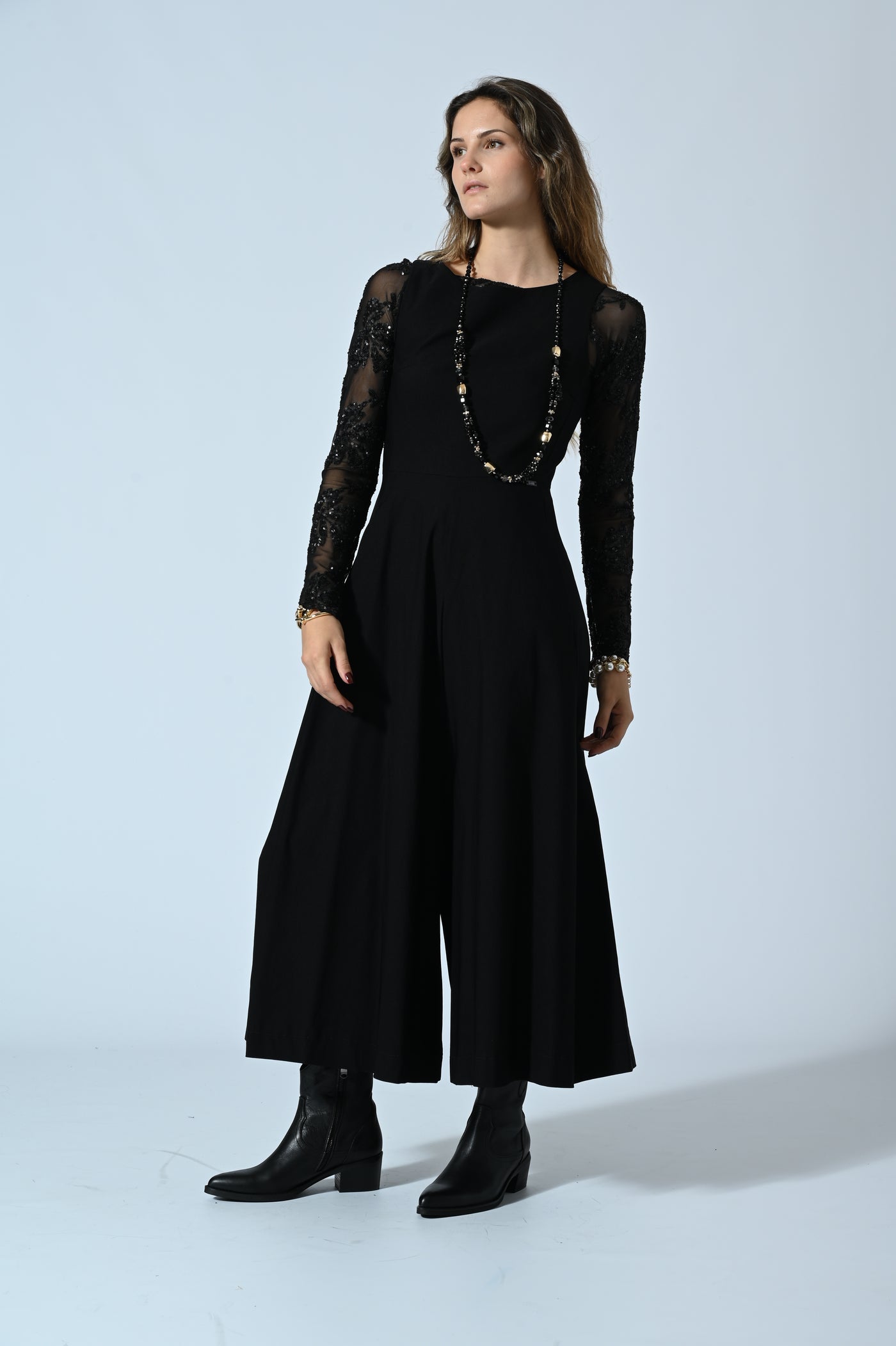 TUTA SMANICATA GAMBA LARGA