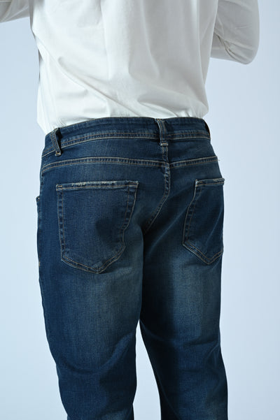 DENIM 5 TASCHE SLIM CON ABRASIONI